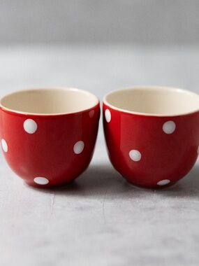 Pair of small Spode 2008 red Christmas cups with white polka dots 1.75" tall